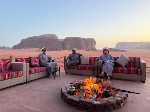 A Bedouin elder telling stories around a campfire, the light of the fire illuminating their face and casting long shadows