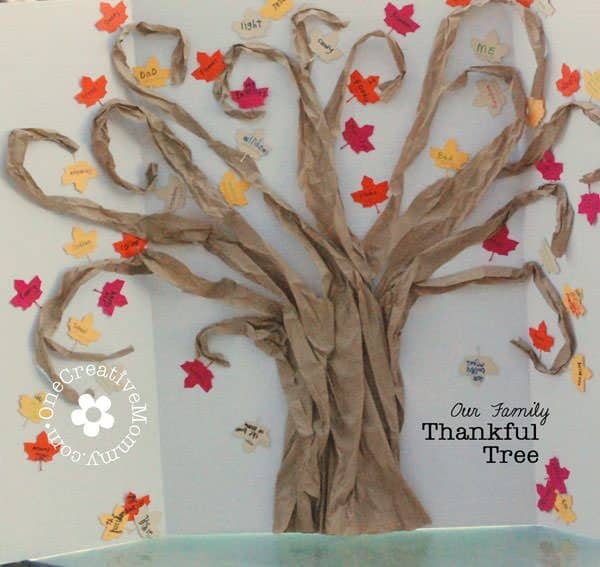 Close-up of a handwritten message of gratitude on a paper leaf: 