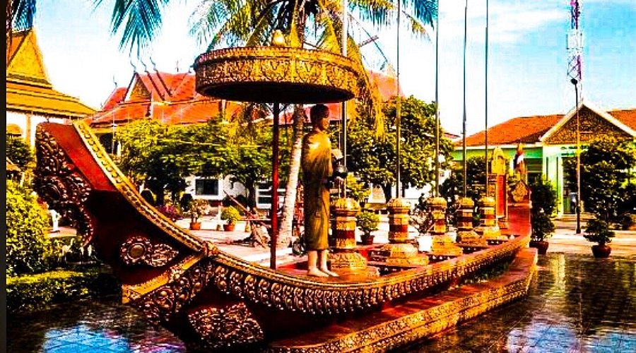 Khmer BBQ at a table with cooking food.
