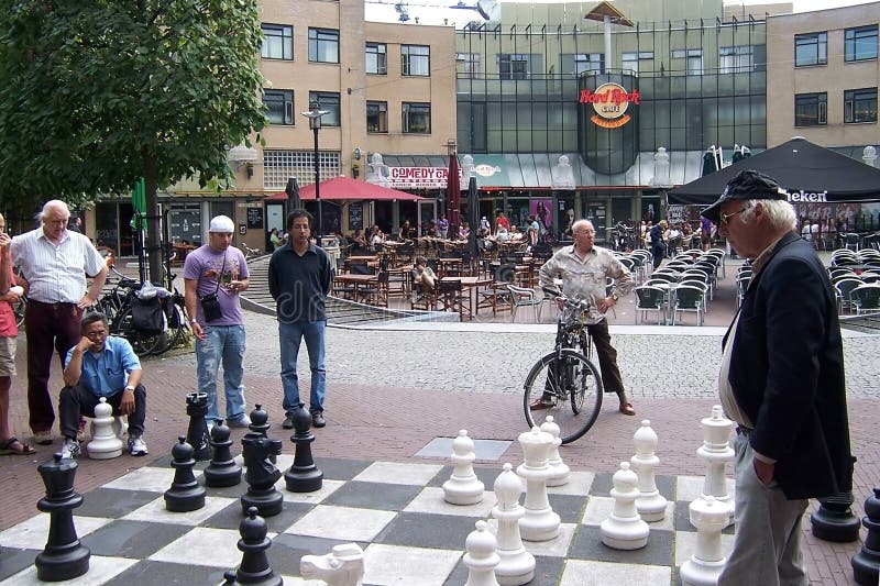 Ben holding a Kapsalon, looking both disgusted and intrigued