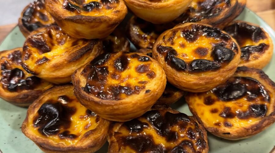 A digital nomad learning how to make Pastel de Nata at a workshop