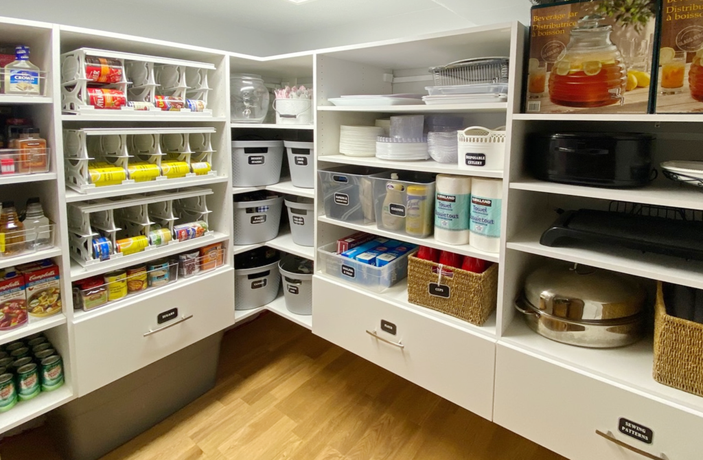 A clean and empty pantry shelf awaiting organization