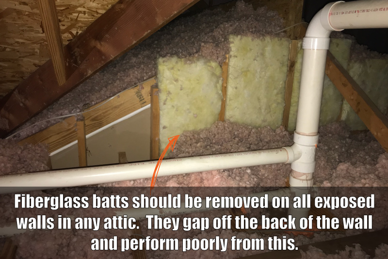 House with a section of siding removed, revealing the wall cavity and the process of blowing in cellulose insulation