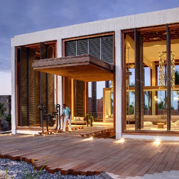 The rooftop pool boasts stunning panoramic views of the coastline, perfect for relaxation and sunset viewing