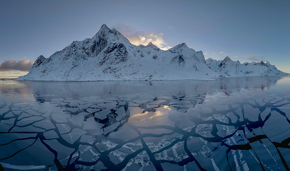 Person Ice Floating in Lofoten Fjord
