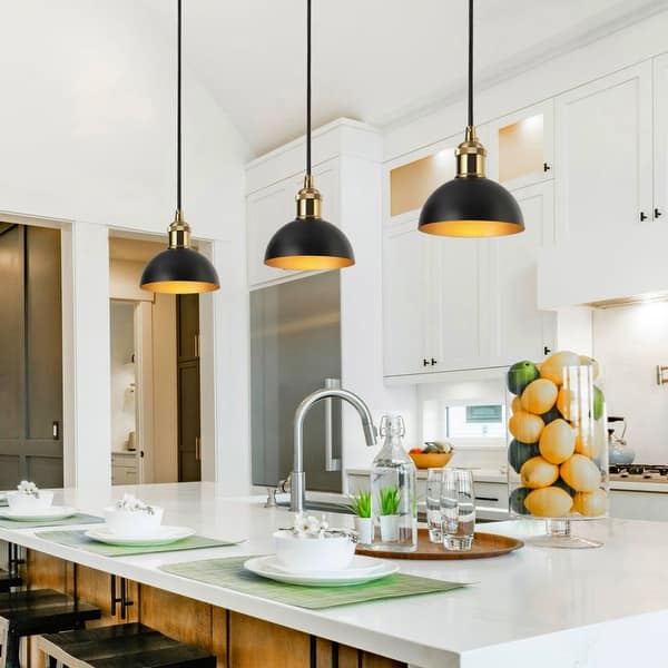 A selection of dried herbs hanging in a farmhouse kitchen, showcasing a sustainable way to preserve flavors.