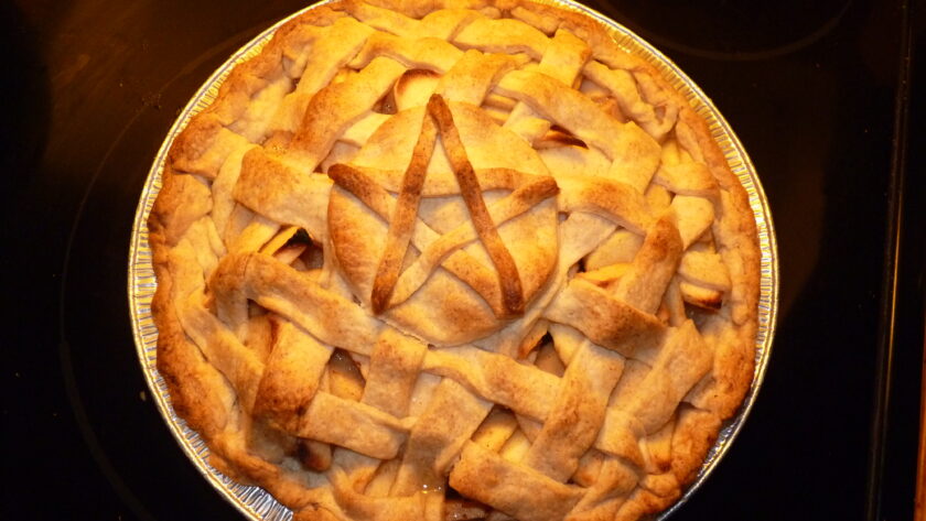 A cozy winter scene with pie on a table