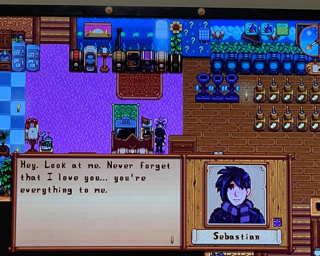 Screenshot of a settlement under attack by a horde of Raiders, with turrets firing and settlers defending their homes.