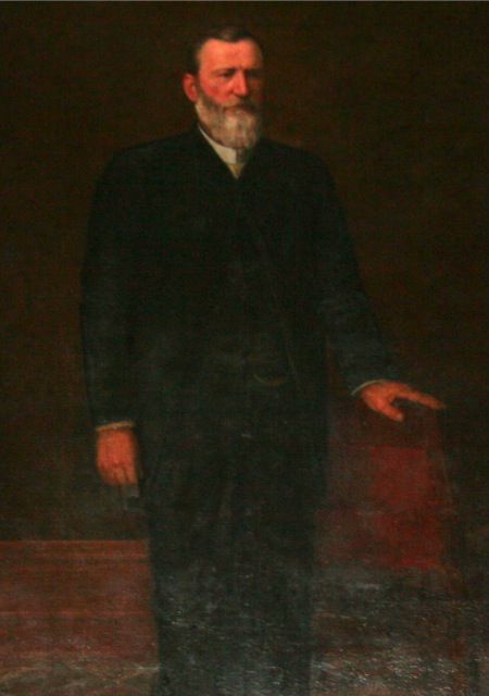 Afternoon tea setting at The Driskill hotel, featuring delicate pastries and tea set up on a table.