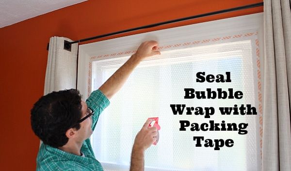 Applying magnetic tape to a window frame