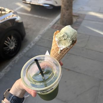 A scoop of dulce de leche ice cream in a waffle cone