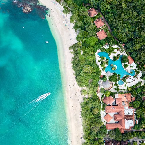 aerial view of tropical island, turquoise water, white sand beach