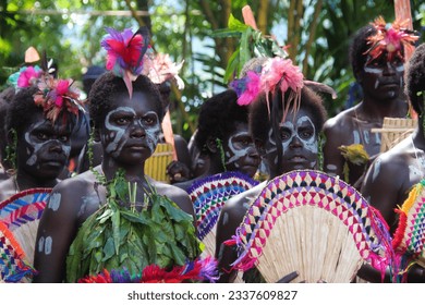 Close-up of face paint swirling in motion at a Singsing festival