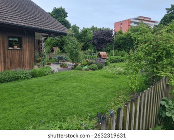 A beautiful farmhouse with a well-tended garden, showcasing a cozy and sustainable home environment