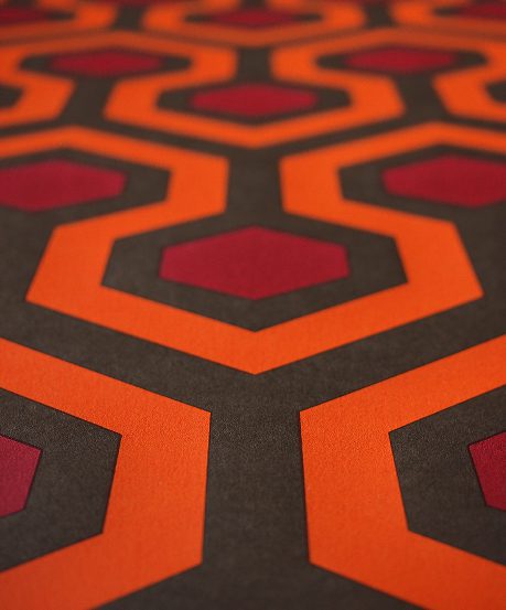 The infamous scene in Room 237 where Jack encounters the beautiful, then decaying, woman in the bathtub, a central point of discussion among theorists.