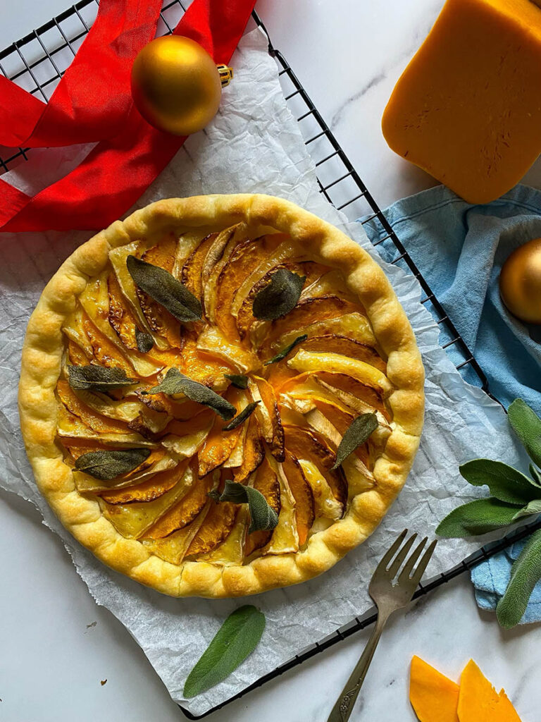 Slice cranberry butternut galette golden crust