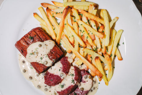 A canoe floating on the turquoise waters of Lake Louise