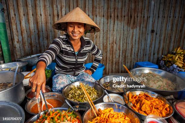 Vietnamese food vendor on local market