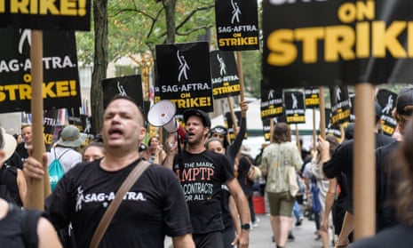 Indie Game Developer Desk Space: A desk space of an independent game developer, filled with an array of tech and art equipment.