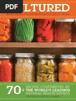 Countertop with jars, weights, salt, garlic, and fresh produce.
