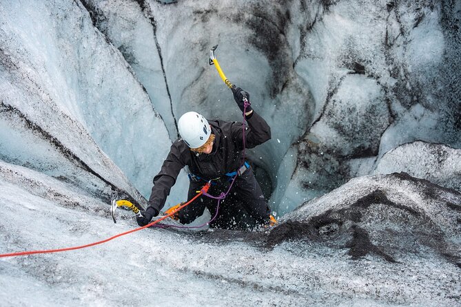 A wide shot of an ice canyon, emphasizing the scale and grandeur of the environment.