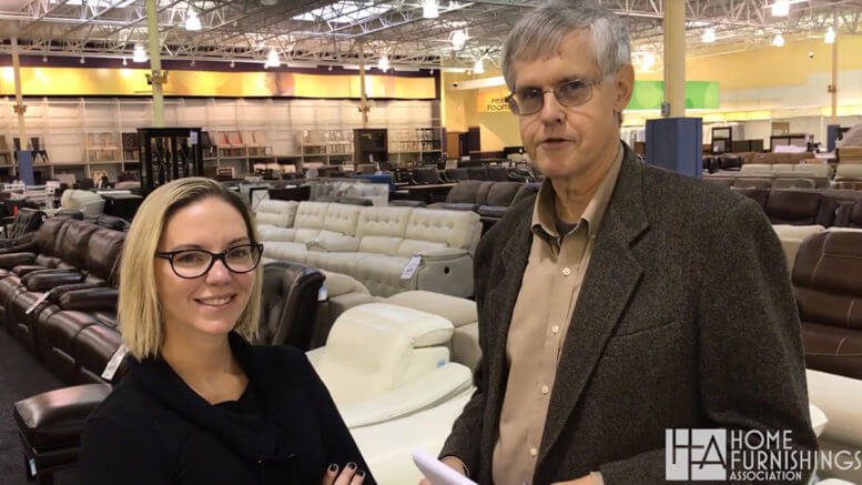 A close-up shot of the character's arm visibly augmented with Cyberware (e.g., a robotic arm or subdermal implants), with a shallow depth of field blurring the background. The image shows a high-resolution texture and details of the augmentation.