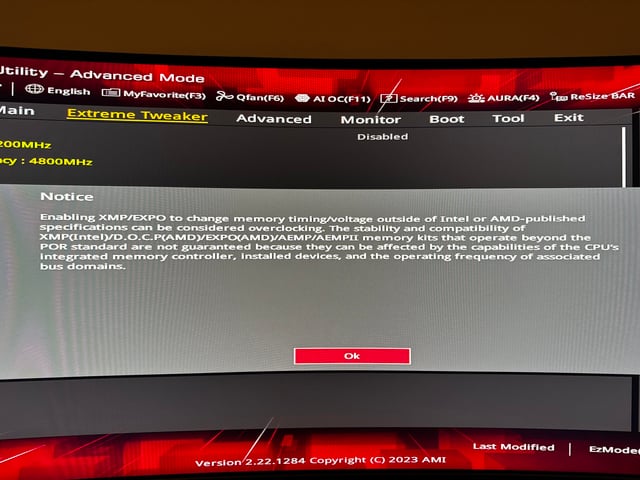 Close-up of the ASUS ROG Crosshair X670E Hero motherboard with the AMD Ryzen 7 7800X3D installed, G.Skill Trident Z5 Neo RAM visible, showcasing the CPU socket area, good depth of field, RGB lighting subtly illuminated, clean and organized.