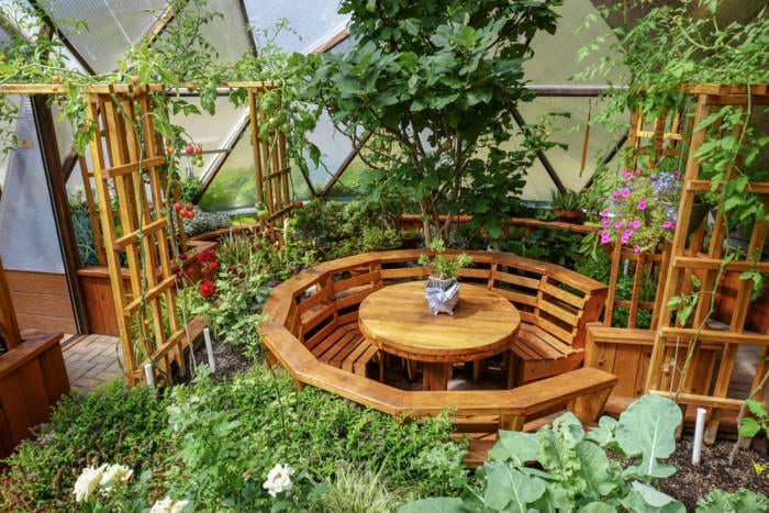 Layering soil components in a raised bed.