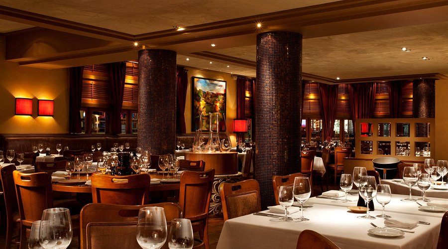 Ethical wildlife photographer taking a photo of a snowshoe hare