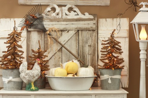 Rosemary potted in an Autumn decorated pot