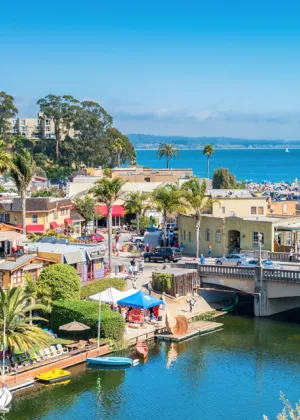 The Firefly Inn's inviting exterior, showcasing its natural materials and earth-toned color palette