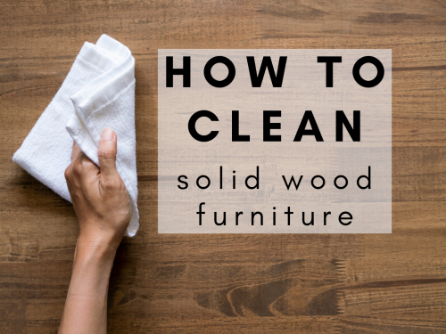 Beeswax furniture polish application on wooden table