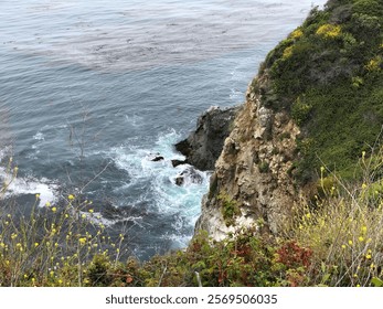 Driving the Pacific Coast Highway with dramatic coastal cliffs