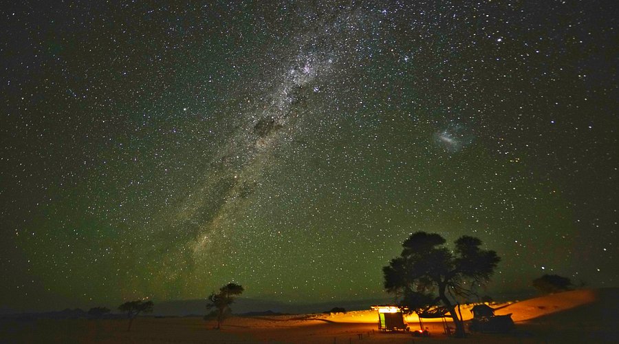 The Milky Way galaxy stretching across the Namibian night sky, captured during an astrophotography workshop in Damaraland. The image showcases the inky blackness of the sky and the stunning detail of nebulae and galaxies.