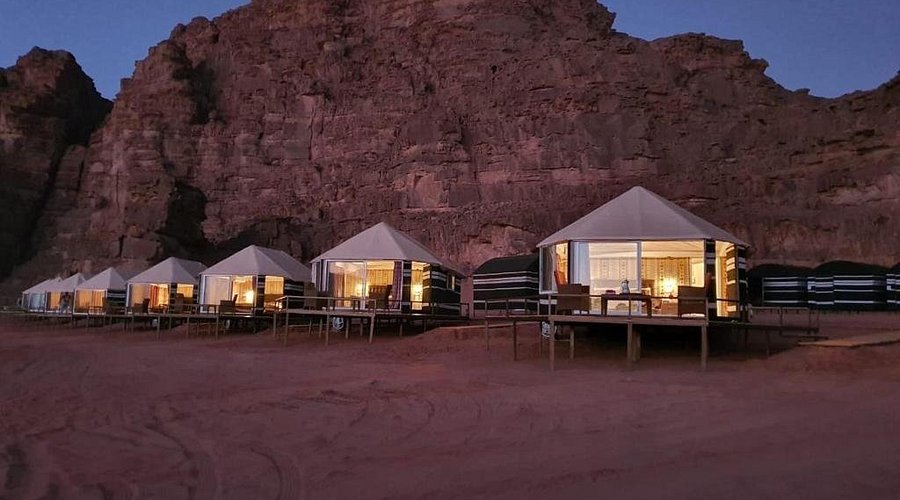 A Bedouin tent under a sky full of stars
