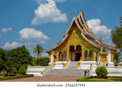 The golden facade of Haw Kham (Royal Palace Museum) in Luang Prabang, showcasing the beautiful architecture and historical significance of the site.