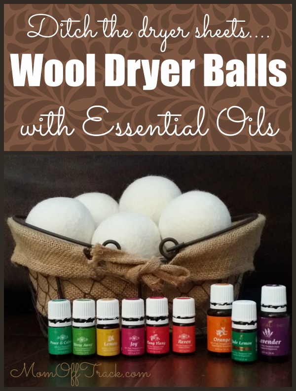 A mason jar (small appearance) containing essential oils next to a finished wool dryer ball. Note: the jar itself is blurred in the background.