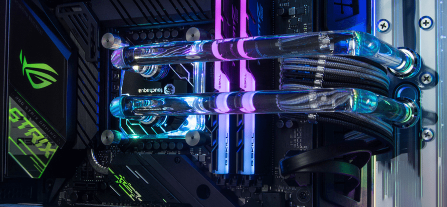 Close-up shot of the finished water-cooling loop highlighting the coolant flowing, textures of blocks, and subtle RGB lighting effects