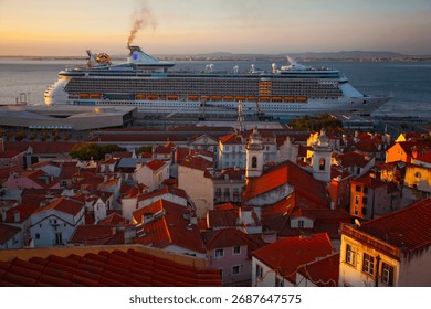 Sunrise over the Tagus River and the 25 de Abril Bridge from a rooftop terrace