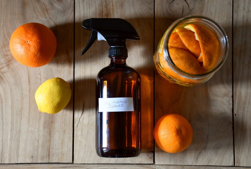 rustic spray bottles citrus rosemary countertop