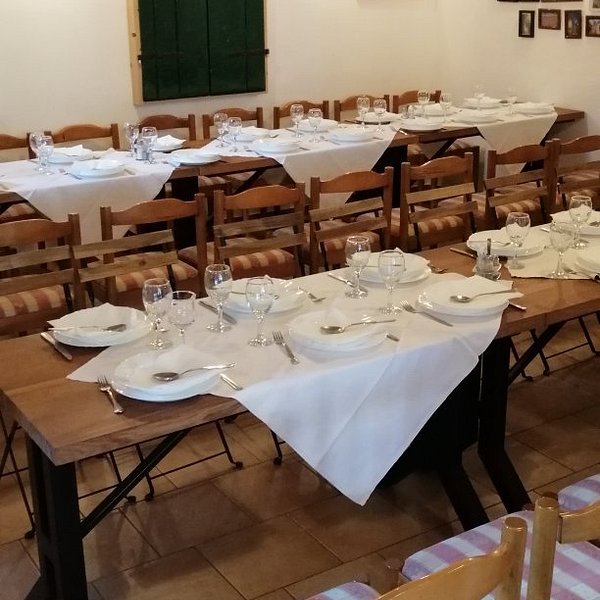 Wooden boardwalks wind through the turquoise waters and travertine formations of Plitvice Lakes.