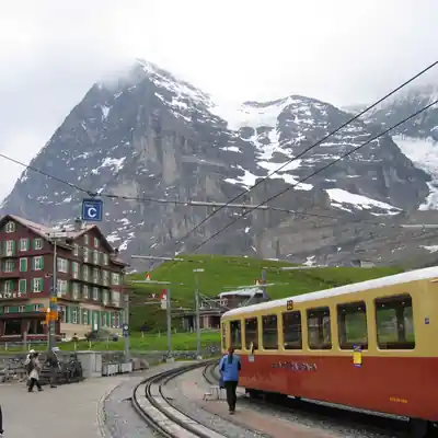 Rock climber silhouetted against the setting sun in Yosemite National Park