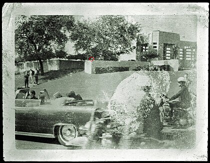 Conclusion that summarizes the unanswered questions surrounding the Umbrella Man, the limits of photographic analysis, and the need for corroborating evidence.