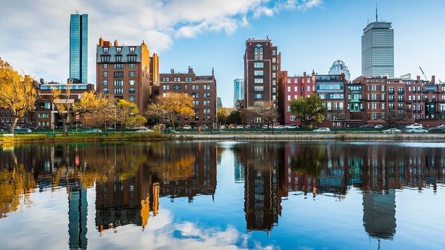 The central rotunda of The Liberty Hotel, showcasing the towering ceilings and original jail bars