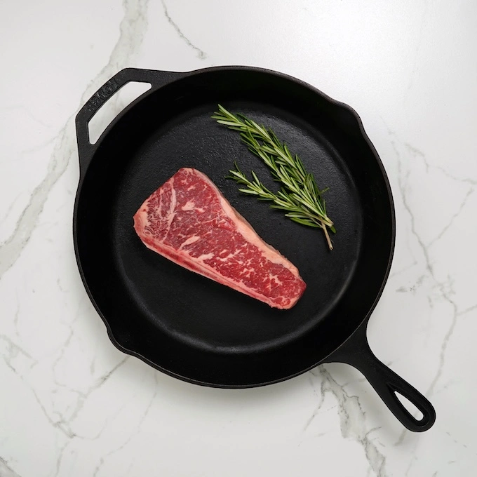 Foil packets cooking on a campfire