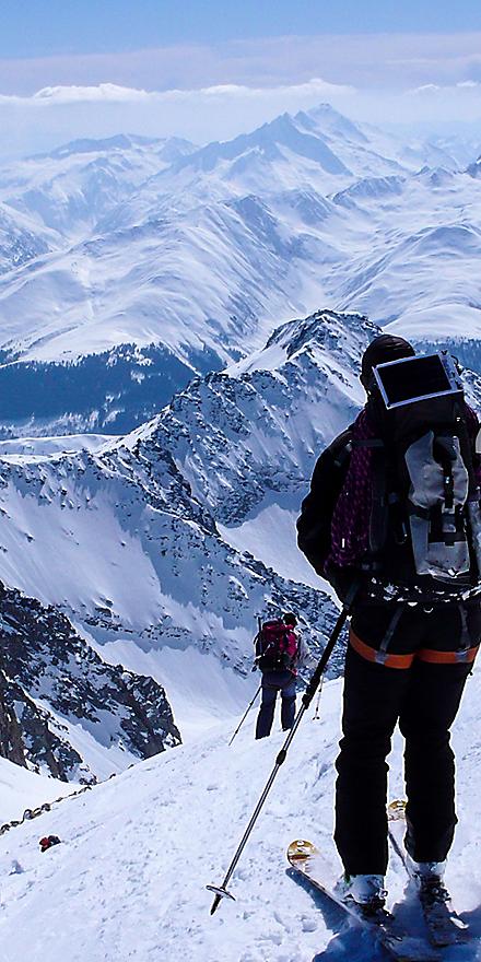 Skiers enjoying the slopes of the Swiss Alps