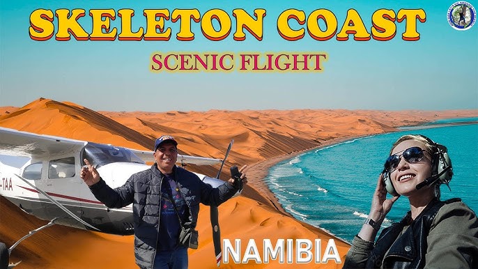 A vintage Cessna 210 soars over the dunes