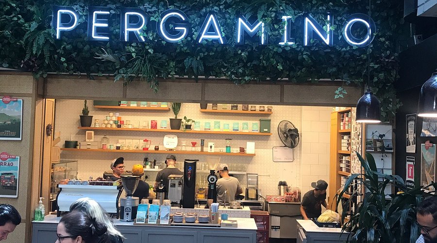 A panoramic photo of Medellín at sunset, highlighting the city's skyline, surrounding mountains, and vibrant urban environment. The alt text conveys the beauty and appeal of Medellín as a place to live.