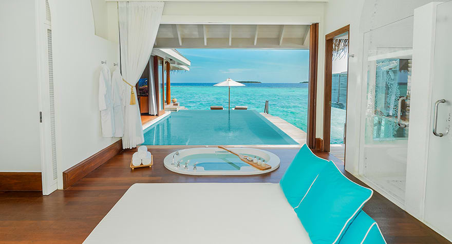 Aerial view of Azure Haven's overwater bungalows