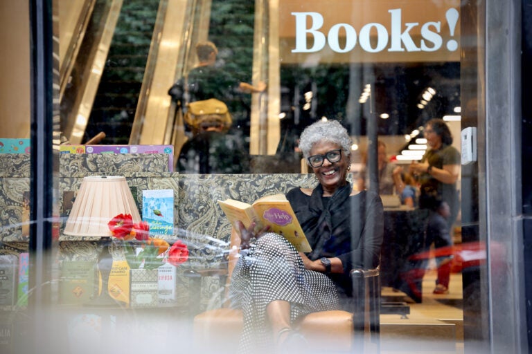 Close-up of a customer browsing books in a bookstore